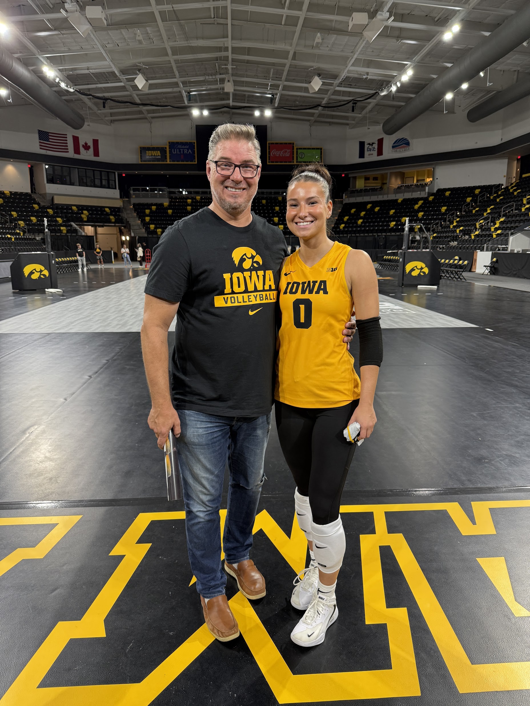 Roger and Allison Berent at Iowa volleyball